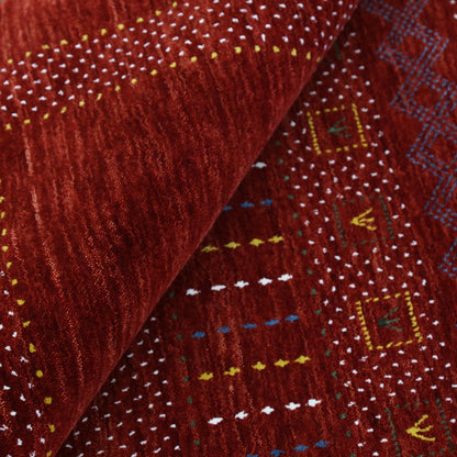 Red Center Pattern Hand Loomed Wool Area Rug.