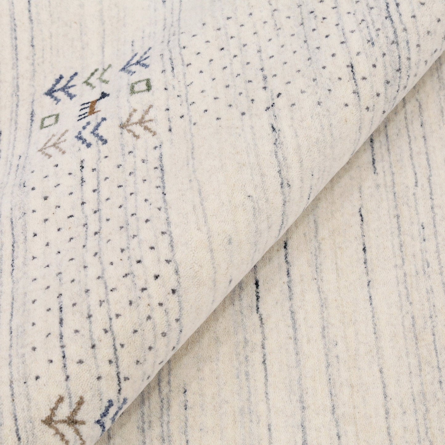 Solid Ivory Border Patterns Hand Loomed Wool Area Rug.