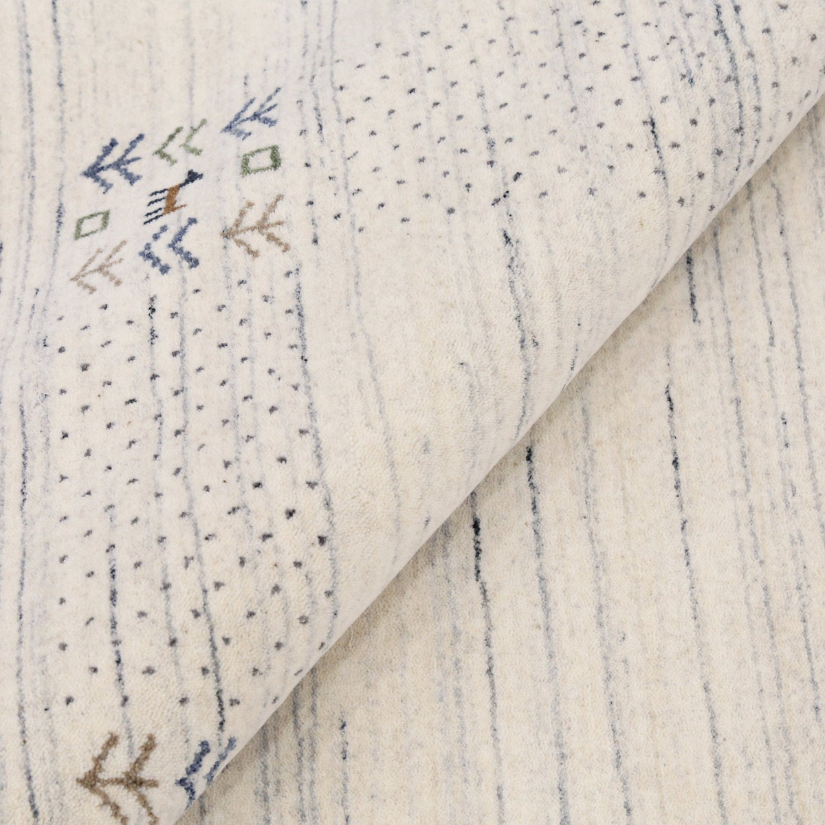 Solid Ivory Border Patterns Hand Loomed Wool Area Rug.