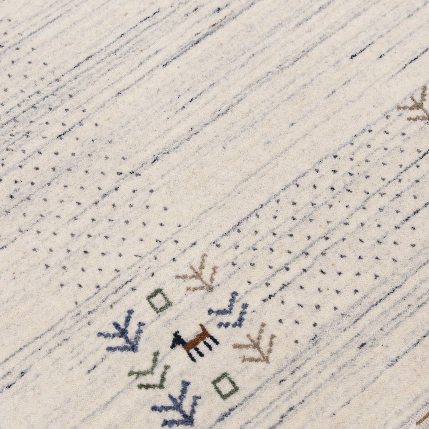 Solid Ivory Border Patterns Hand Loomed Wool Area Rug.
