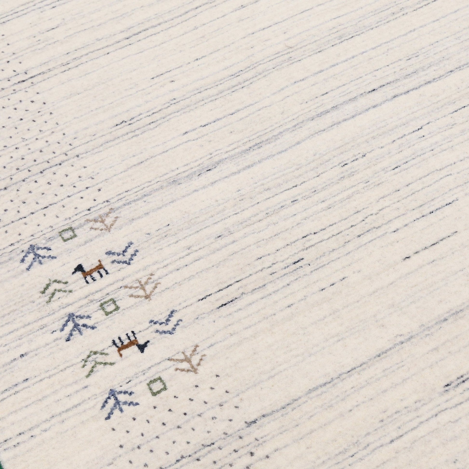 Solid Ivory Border Patterns Hand Loomed Wool Area Rug.
