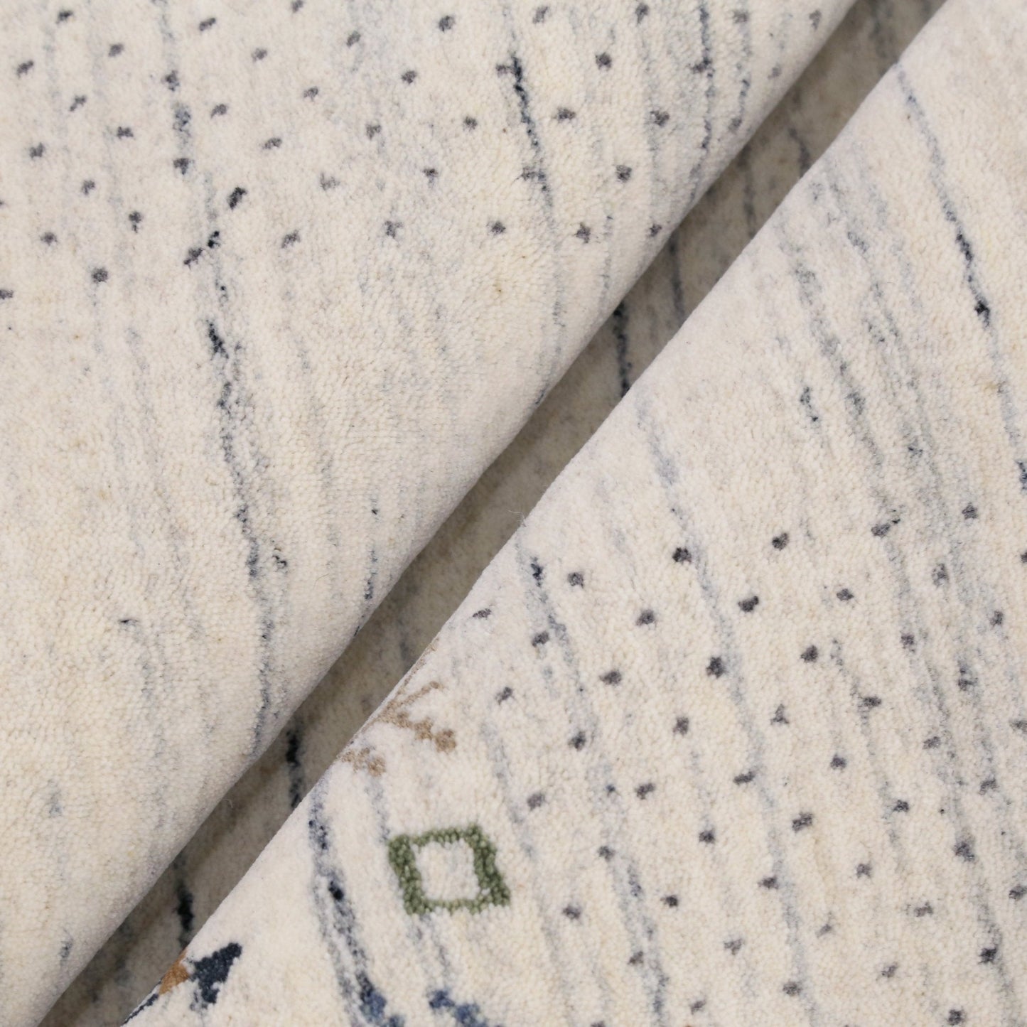 Solid Ivory Border Patterns Hand Loomed Wool Area Rug.