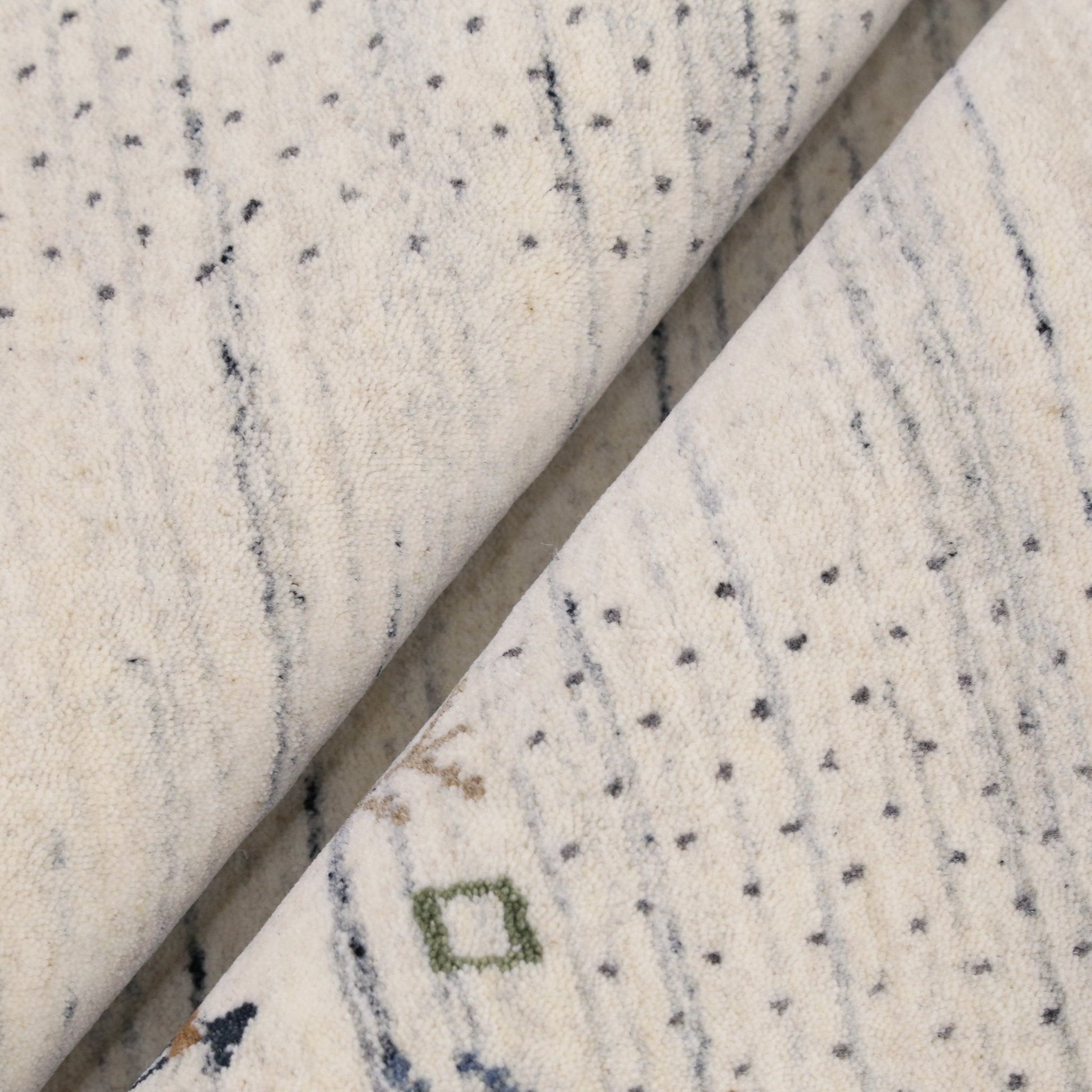 Solid Ivory Border Patterns Hand Loomed Wool Area Rug.