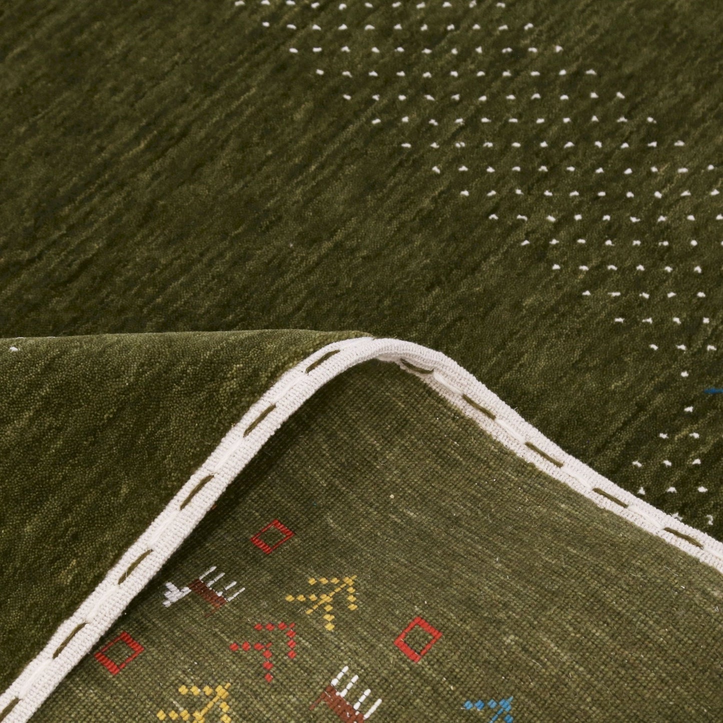 Solid with Border Patterns Hand Loomed Wool Area Rug.
