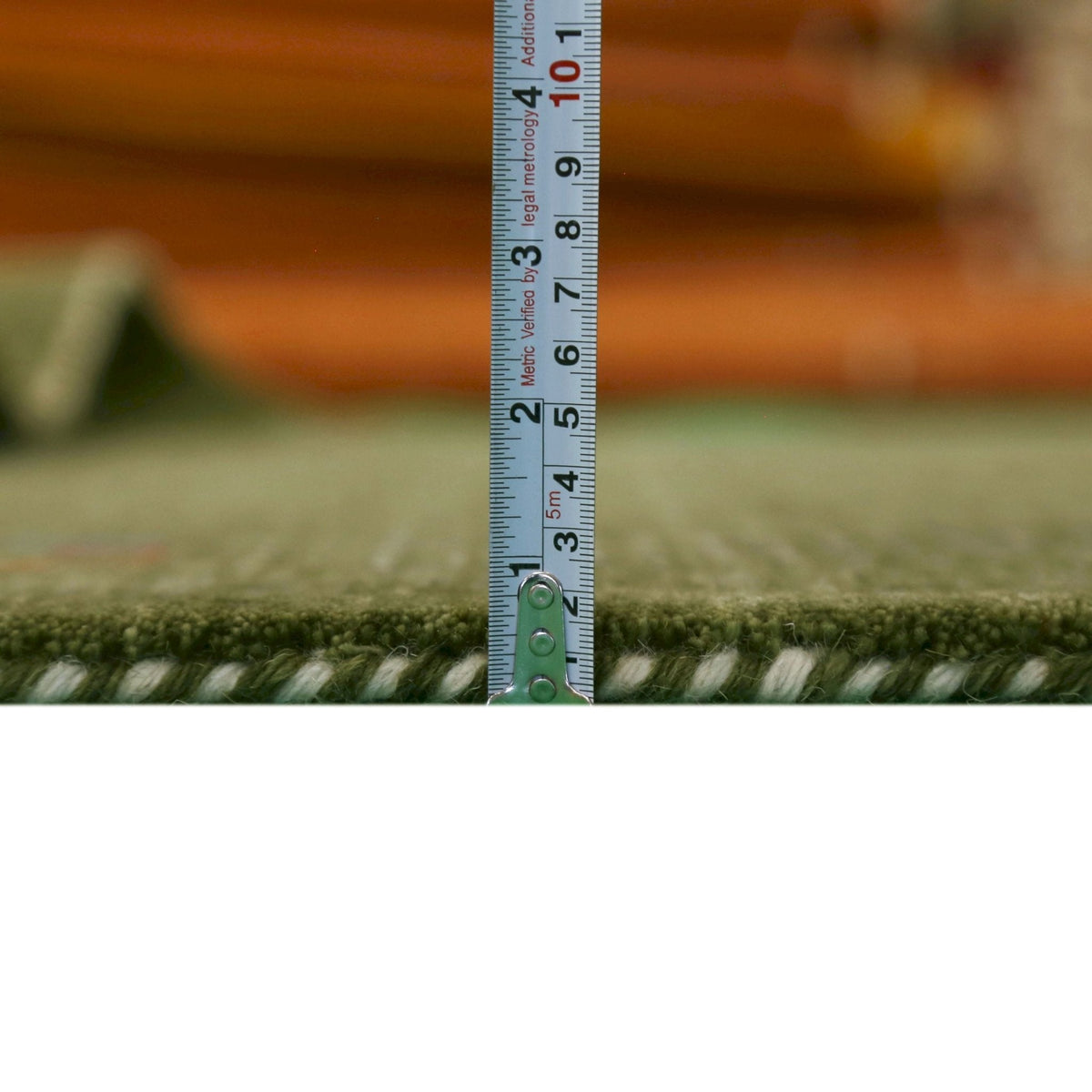 Solid with Border Patterns Hand Loomed Wool Area Rug.