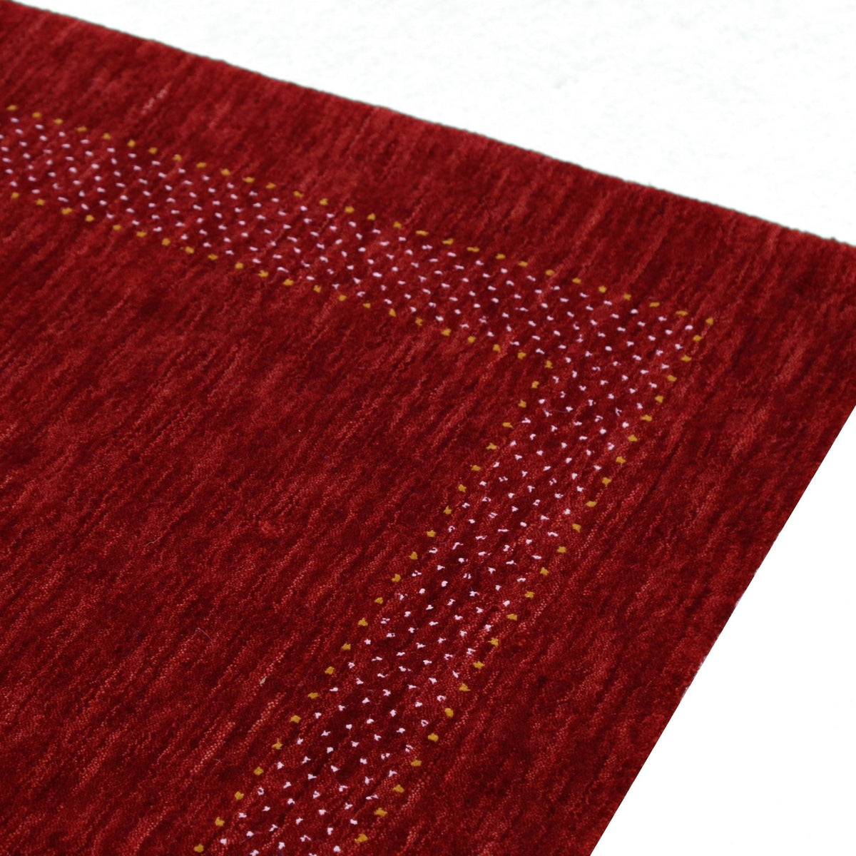 Red Center Pattern Hand Loomed Wool Area Rug.