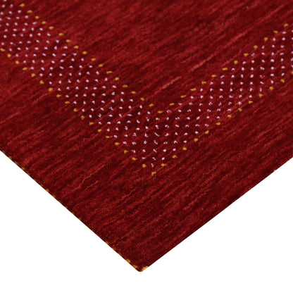 Red Center Pattern Hand Loomed Wool Area Rug.