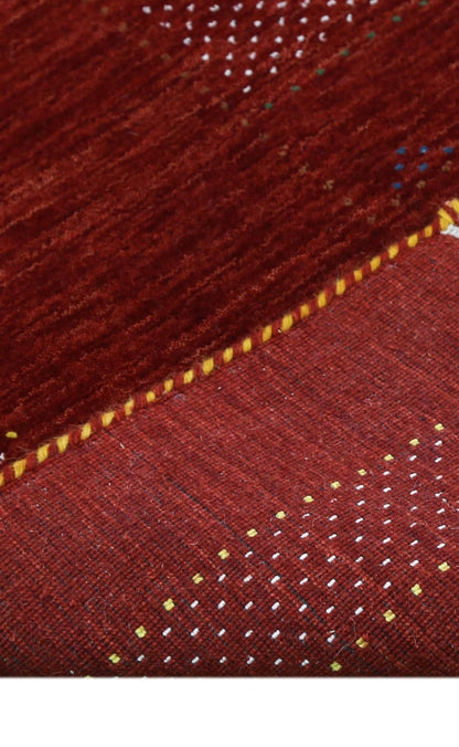 Red Center Pattern Hand Loomed Wool Area Rug.