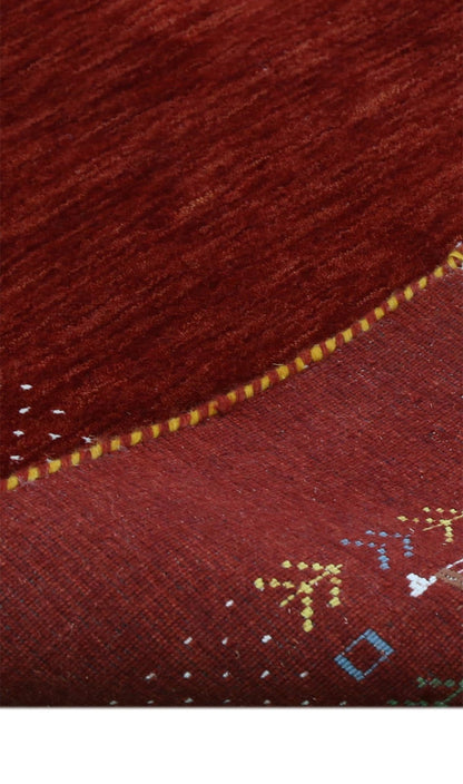 Red Contemporary Border Motifs Hand Loomed Wool Area Rug.