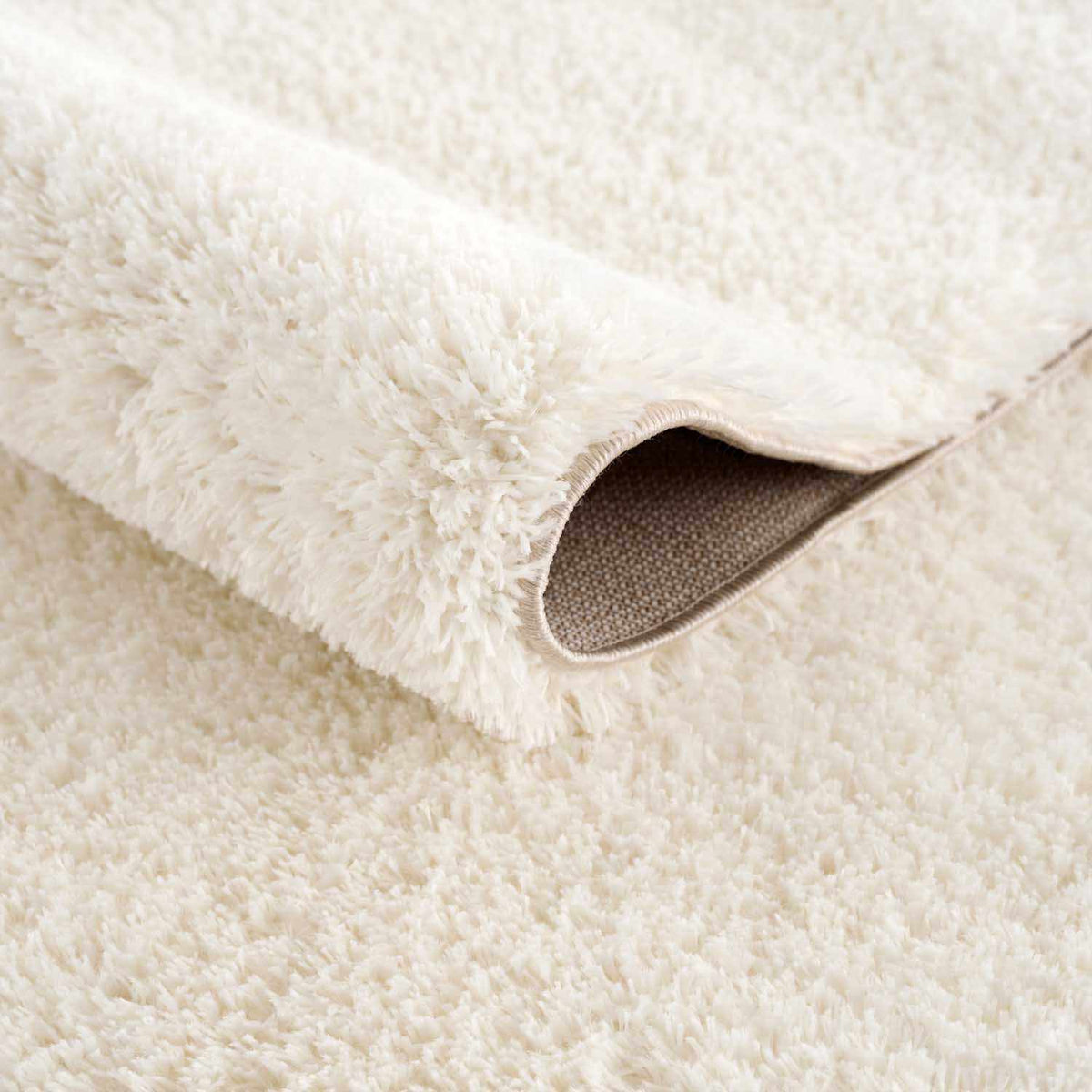Crevalo Cream Subtle Wavy Abstract Modern Minimalist Polyester Machine Woven Area Rug
