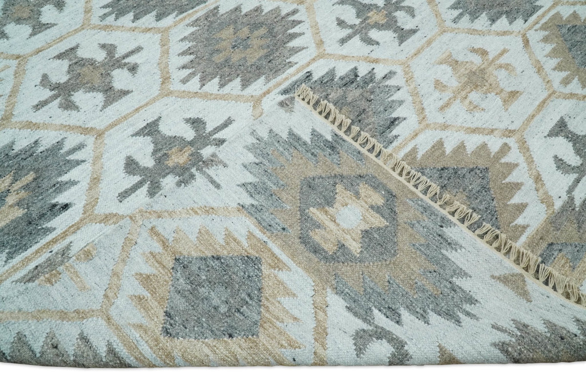 Ivory And Beige Modern Style Fine Wool and Viscose Rug.