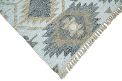 Ivory And Beige Modern Style Fine Wool and Viscose Rug.
