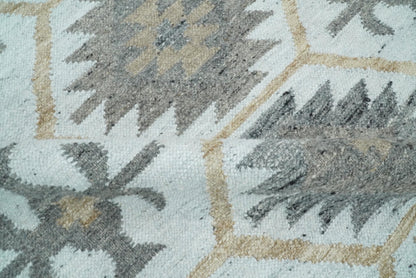 Ivory And Beige Modern Style Fine Wool and Viscose Rug.