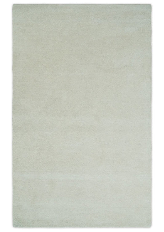 Custom Made Modern Solid Ivory Hand Tufted Wool Rug.