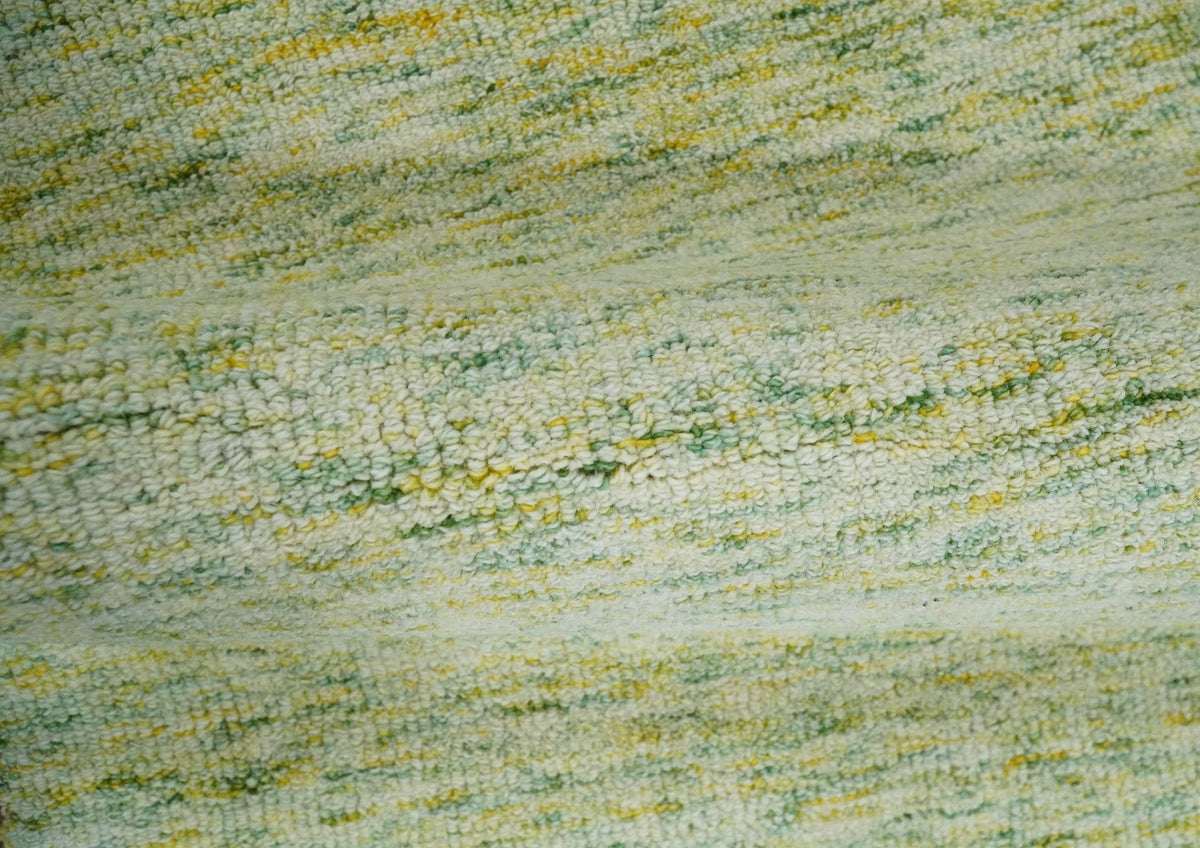 Custom Made Solid Green And Ivory Hand Tufted Natural Wool Area Rug.