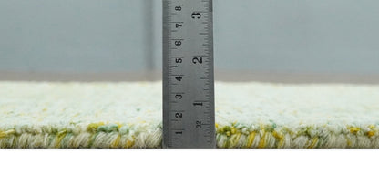 Custom Made Solid Green And Ivory Hand Tufted Natural Wool Area Rug.