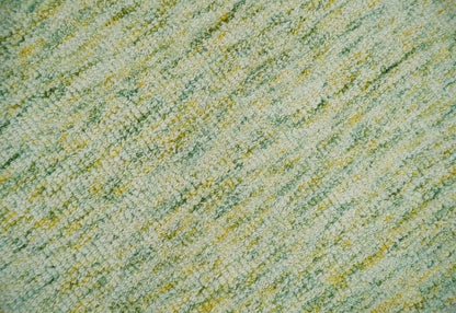 Custom Made Solid Green And Ivory Hand Tufted Natural Wool Area Rug.