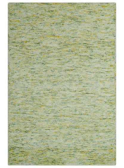 Custom Made Solid Green And Ivory Hand Tufted Natural Wool Area Rug.