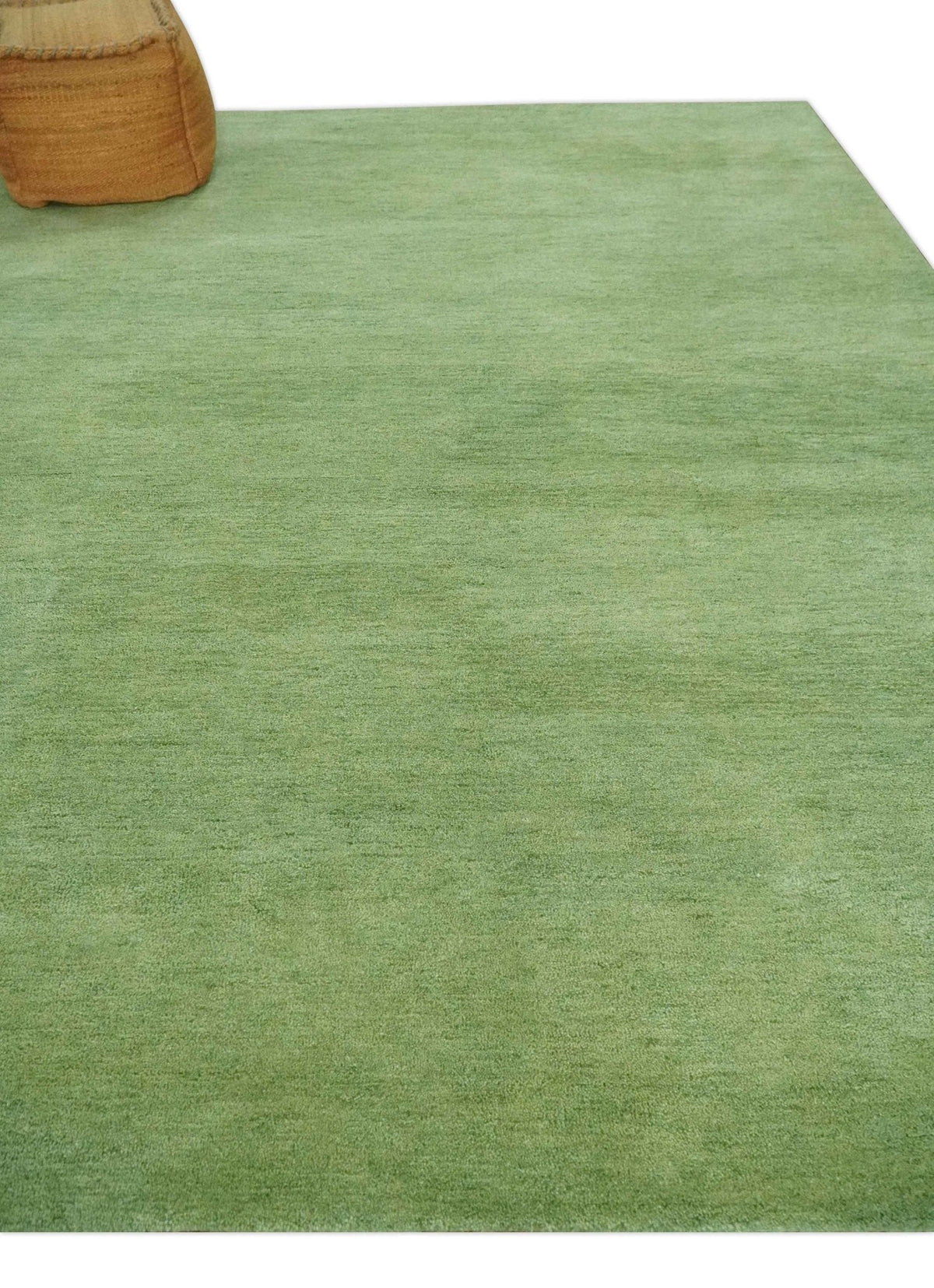 Custom Made solid Green Woolen Hand Tufted contemporary area Rug.