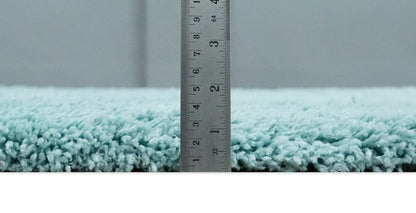 Solid Plush and Soft 3x5, 4x6 and 5x7 Hand Woven Shag Teal Area Rug.