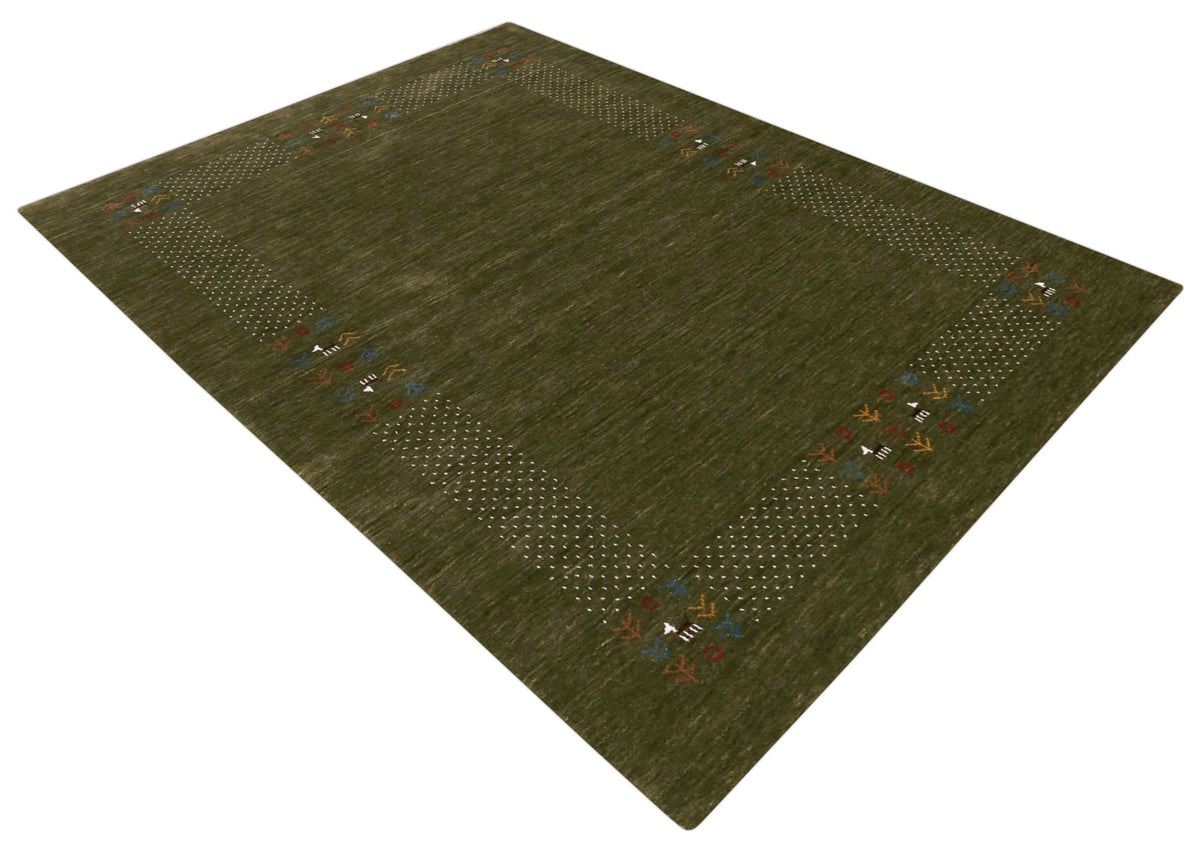 Solid with Border Patterns Hand Loomed Wool Area Rug.