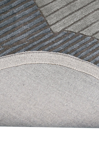 Stone Modern Gray And Silver Hand Tufted 5x7 Wool Area Rug.