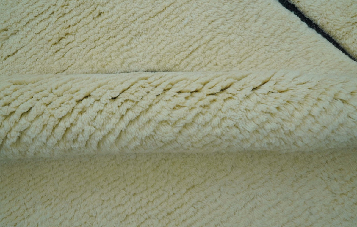 Strokes Custom Made Contemporary Cream Hand Knotted Wool Rug.