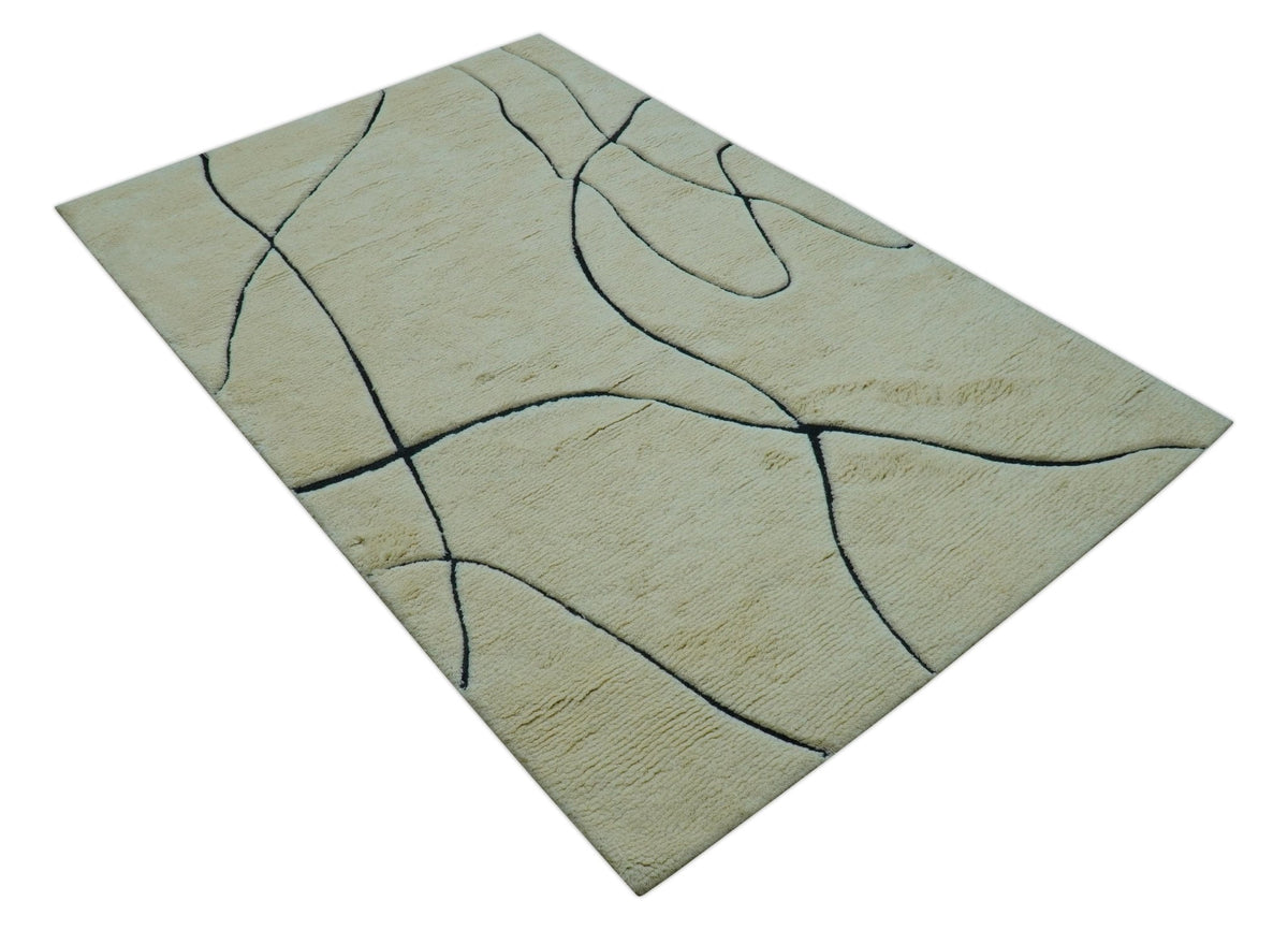 Strokes Custom Made Contemporary Cream Hand Knotted Wool Rug.