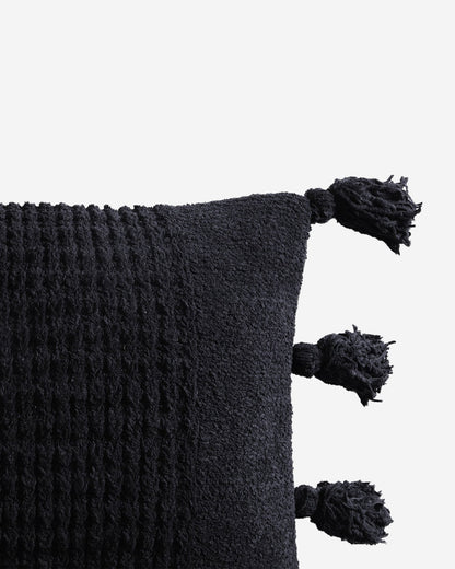 Braided Pom Pom Lumbar Pillow.