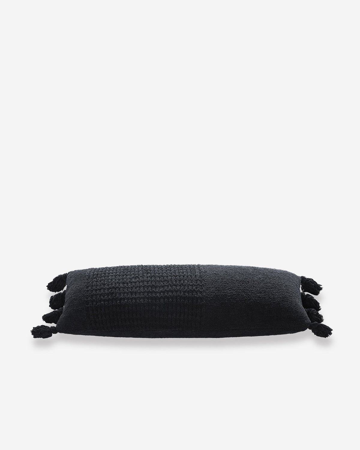 Braided Pom Pom Lumbar Pillow.