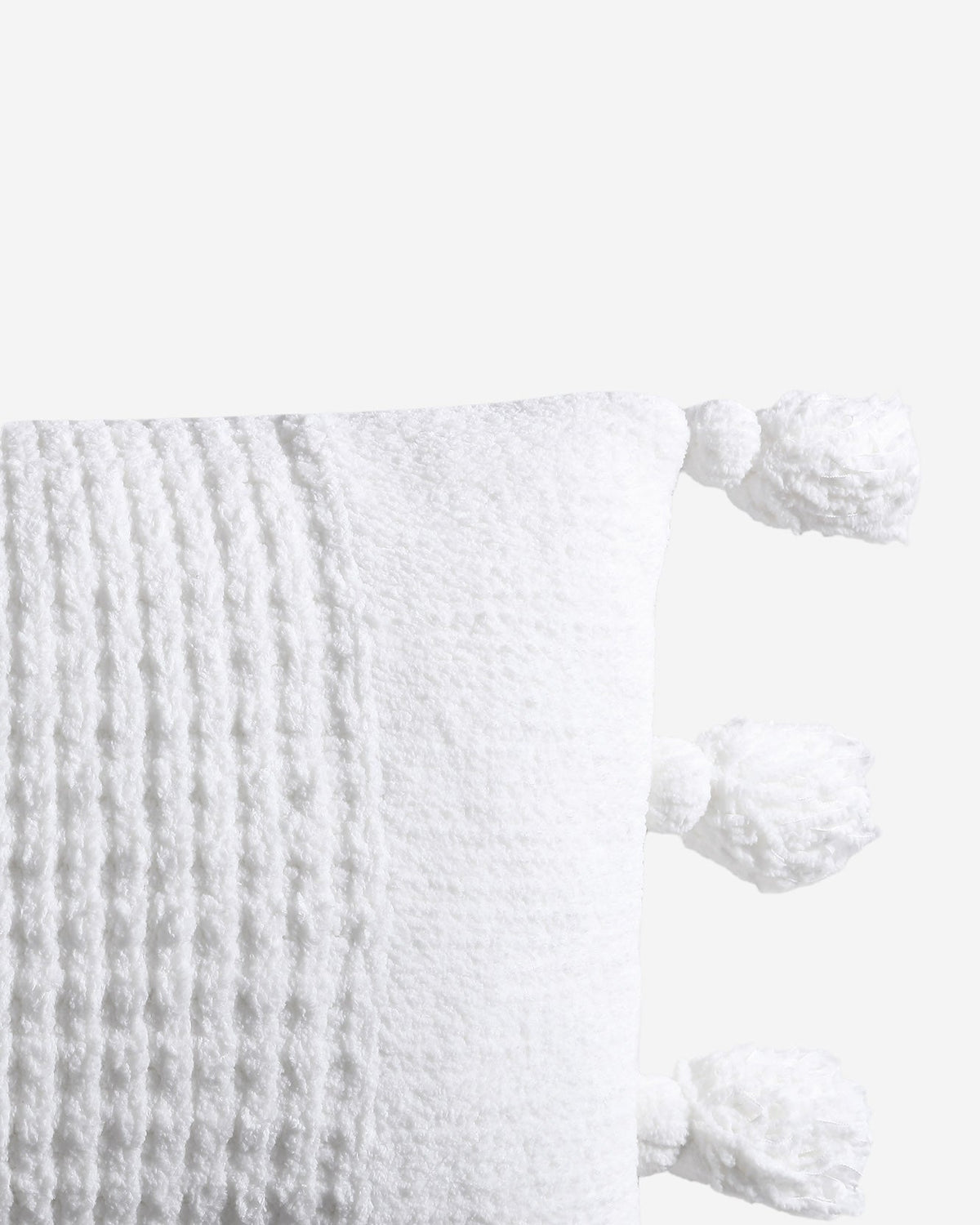 Braided Pom Pom Lumbar Pillow.
