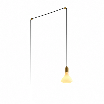 Noma Plug-In Pendant in Brass on a white background
