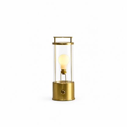 The Muse 1.0 Portable Lamp in Solid Brass on white background