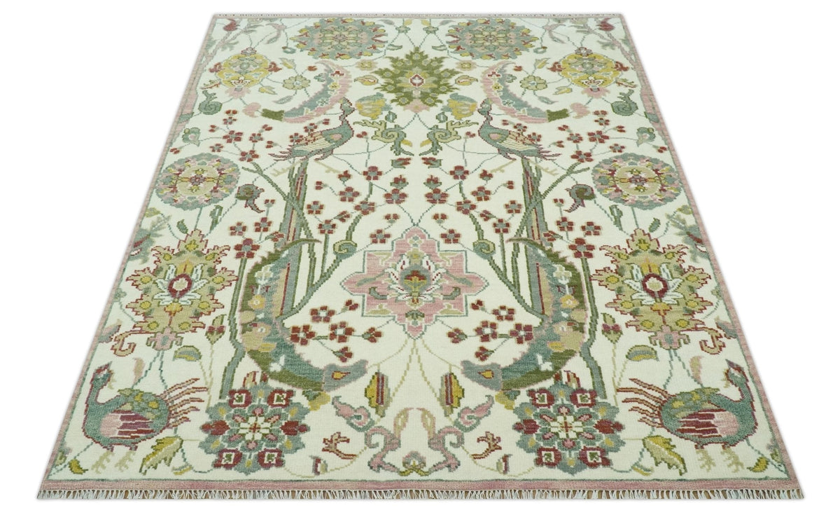 The Peacock Garden Ivory and Green Bird Hand Knotted Multi size Wool Area Rug.