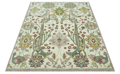 The Peacock Garden Ivory and Green Bird Hand Knotted Multi size Wool Area Rug.