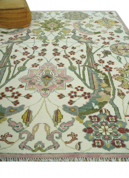 The Peacock Garden Ivory and Green Bird Hand Knotted Multi size Wool Area Rug.