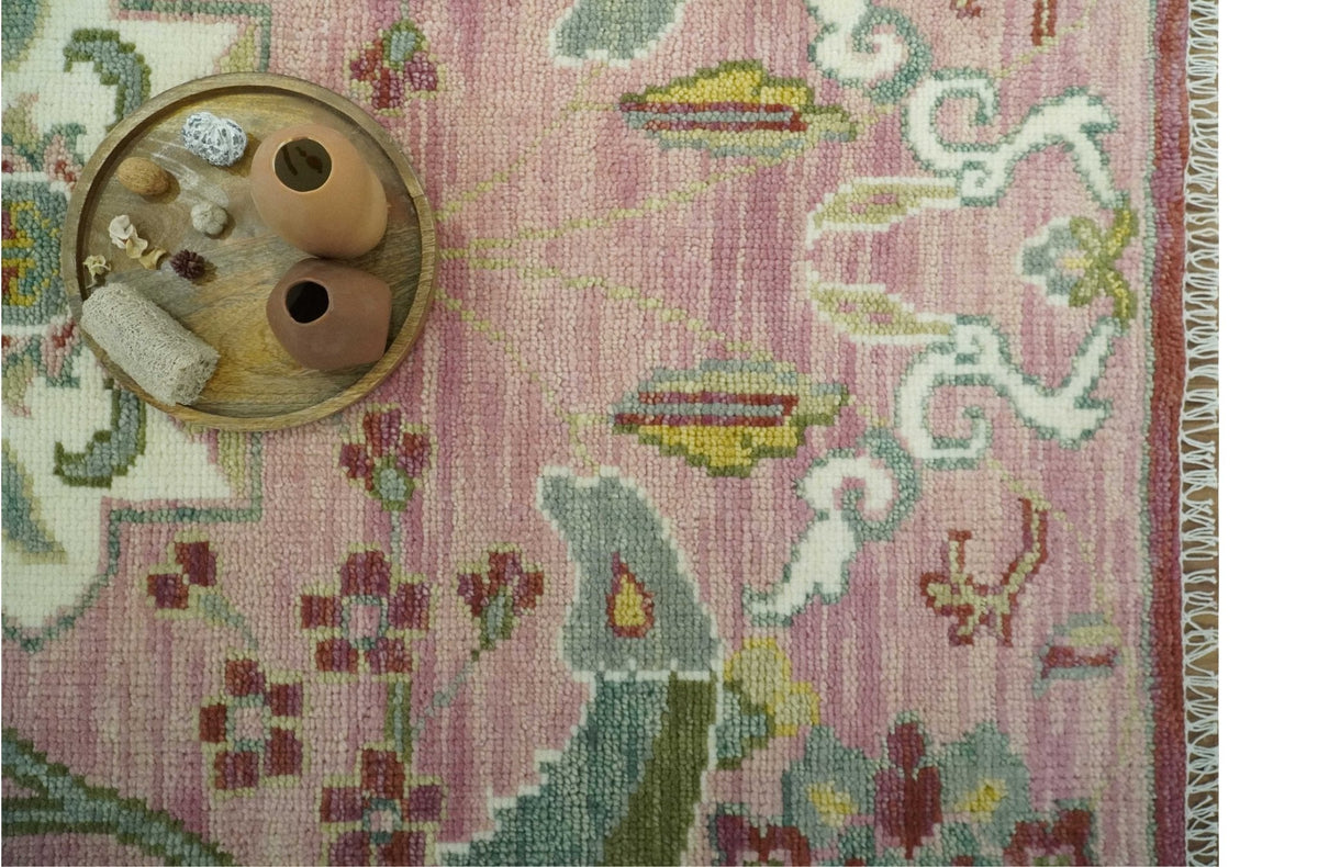 The Peacock Garden Pink and Green Peacock Bird Hand Knotted Multi size Wool Area Rug.