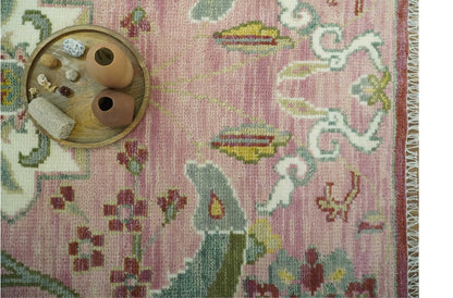 The Peacock Garden Pink and Green Peacock Bird Hand Knotted Multi size Wool Area Rug.