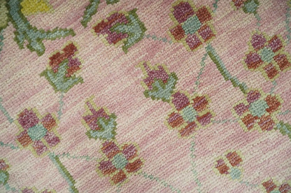 The Peacock Garden Pink and Green Peacock Bird Hand Knotted Multi size Wool Area Rug.
