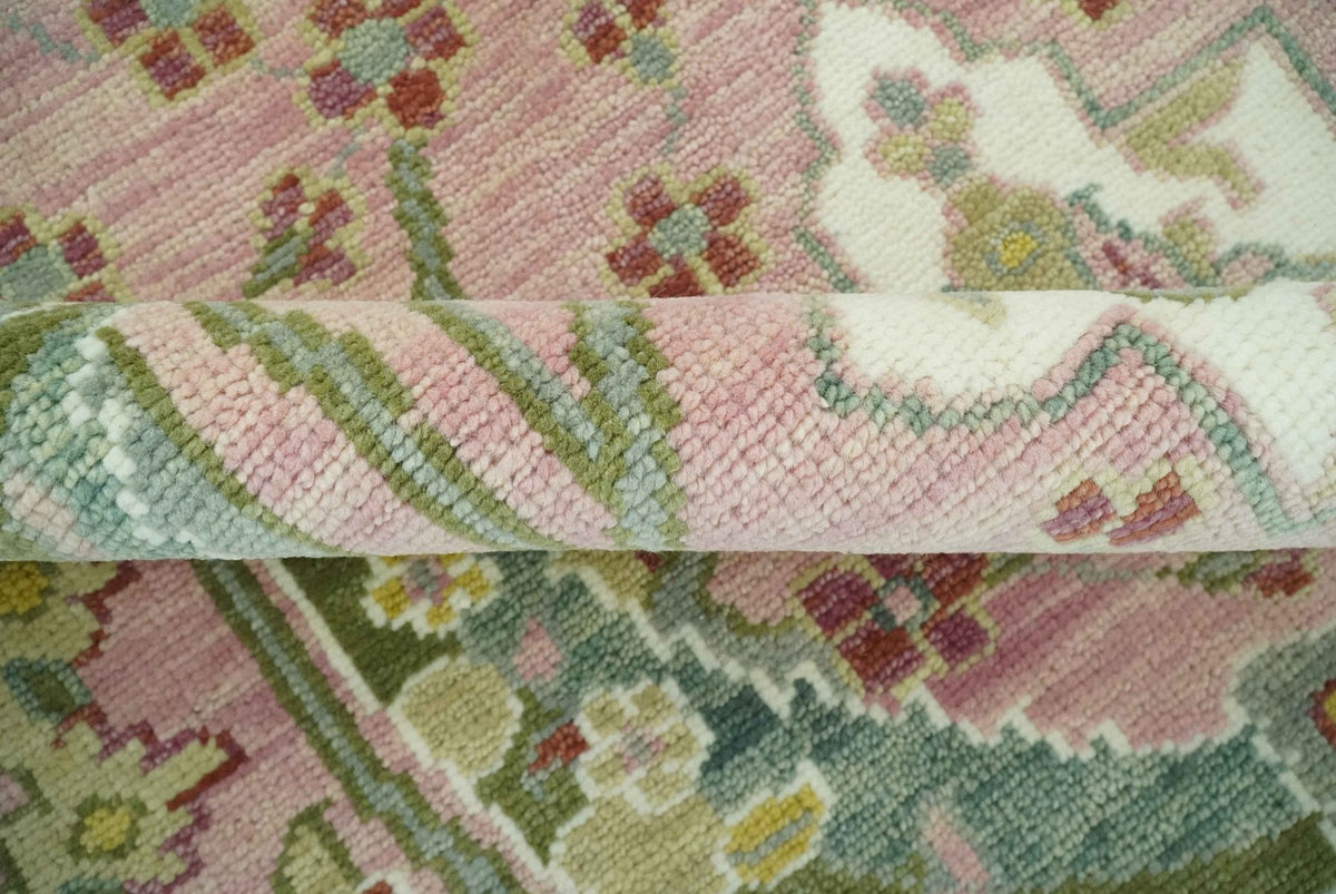 The Peacock Garden Pink and Green Peacock Bird Hand Knotted Multi size Wool Area Rug.