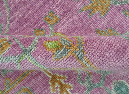 The Plants and Roots Pink and Green Hand Knotted Traditional Custom Made Wool Rug.