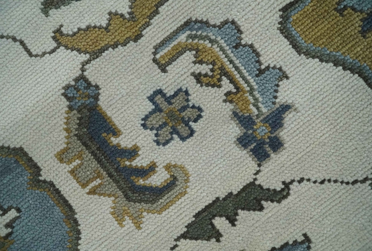 Traditional Ivory and Beige Hand Knotted Oriental Oushak Wool Area Rug.