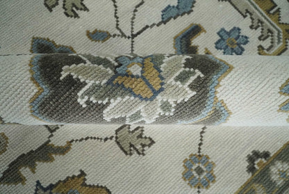 Traditional Ivory and Beige Hand Knotted Oriental Oushak Wool Area Rug.