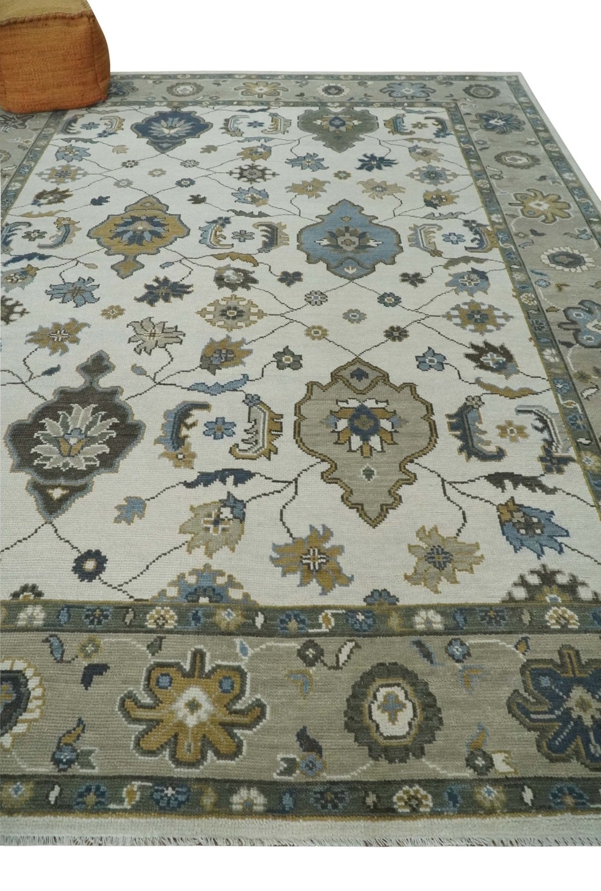 Traditional Ivory and Beige Hand Knotted Oriental Oushak Wool Area Rug.
