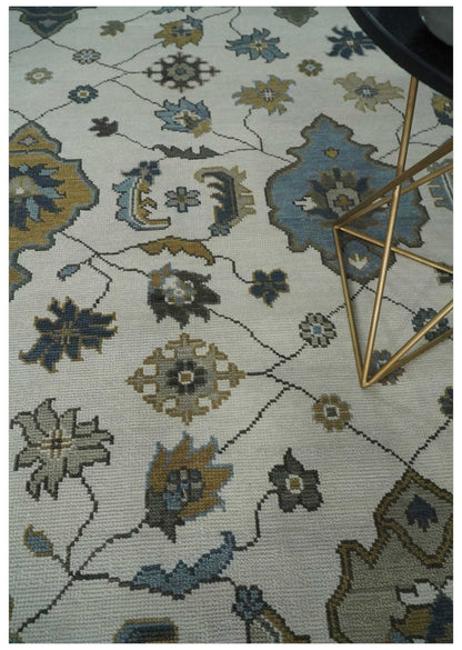 Traditional Ivory and Beige Hand Knotted Oriental Oushak Wool Area Rug.