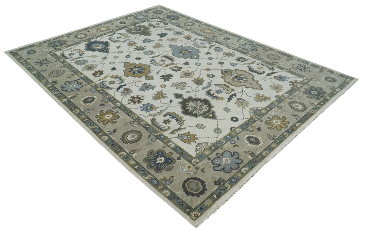 Traditional Ivory and Beige Hand Knotted Oriental Oushak Wool Area Rug.