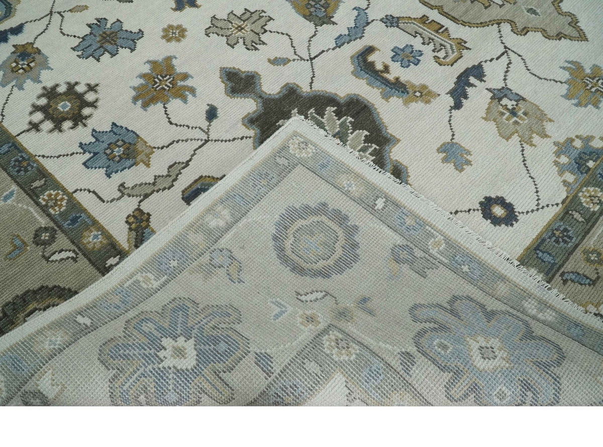 Traditional Ivory and Beige Hand Knotted Oriental Oushak Wool Area Rug.