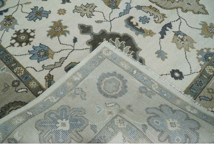 Traditional Ivory and Beige Hand Knotted Oriental Oushak Wool Area Rug.