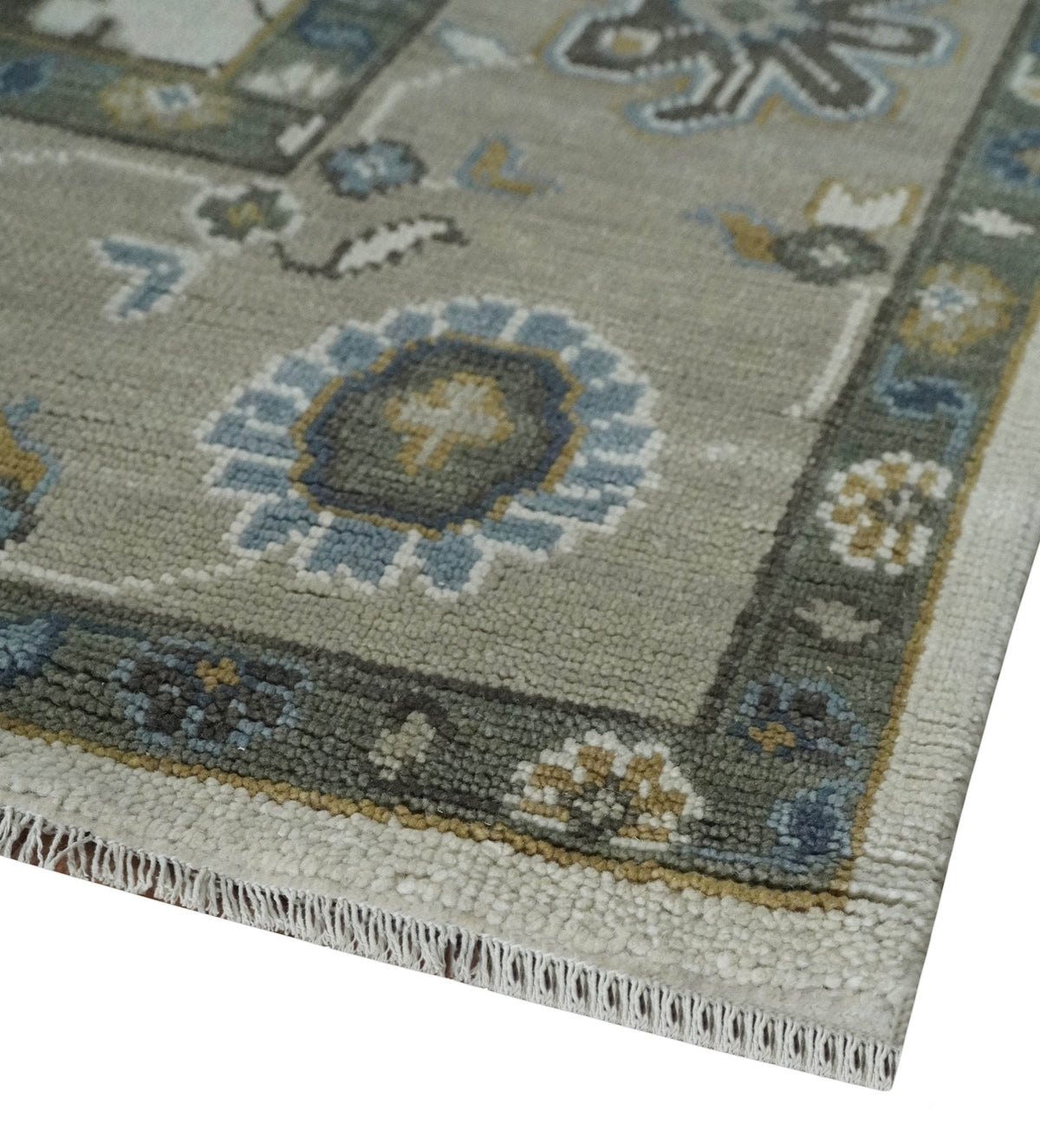 Traditional Ivory and Beige Hand Knotted Oriental Oushak Wool Area Rug.
