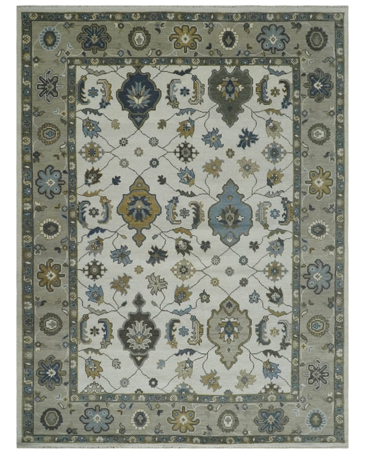 Traditional Ivory and Beige Hand Knotted Oriental Oushak Wool Area Rug.